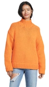 Tory Sport Oversized Chunky Hand Knit Sweater In Vibrant Orange