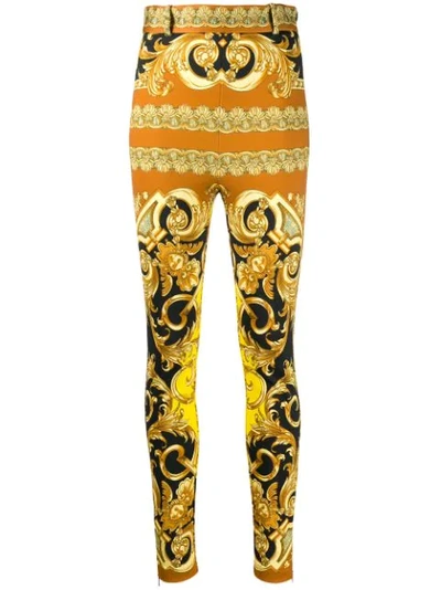 Versace Skinny Printed Stretch Jersey Pants In Yellow