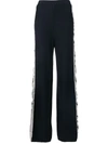 Stella Mccartney Logo Tape Knit Trousers In Blue