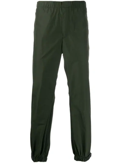 Prada Touch-strap Technical Trousers In Green