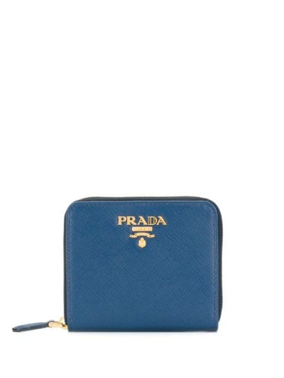 Prada Logo Plaque Zipped Wallet In Blue