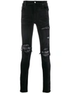 Amiri Distressed Jeans In Black