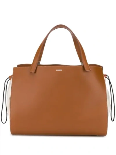 Jil Sander Leather And Canvas Drawstring Handbag In Brown