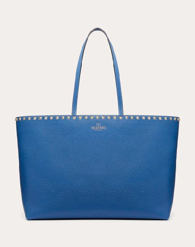 Valentino Garavani Large Grain Calfskin Leather Rockstud Shopping Bag In Blue