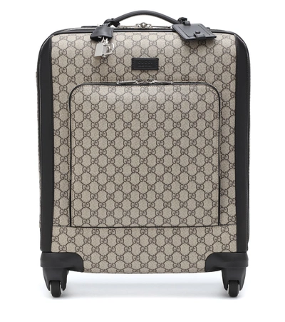 Gucci Gg Supreme Carry-on Suitcase In Brown