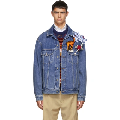 Gucci Appliquéd Faded Denim Jacket In 4206 Blue