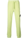 Stone Island Panelled Jogging Trousers In Green