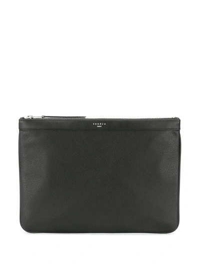 Sandro Logo-stamp Grained Clutch In Black