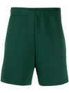 Acne Studios Face Patch Track Shorts In Green
