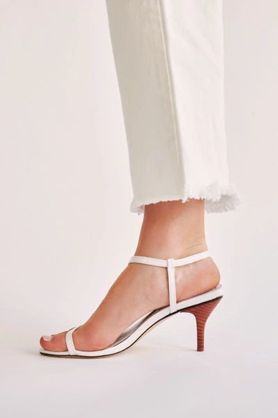 Jaggar Strappy Patent Sandal In Ivory