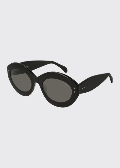 Alaïa Oval Acetate Sunglasses In Black