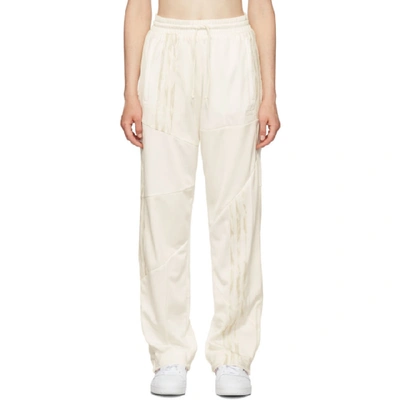 Adidas Originals By Danielle Cathari White Firebird Track Pants In 077a Chlkwh