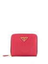 Prada Logo Plaque Zipped Wallet In Red