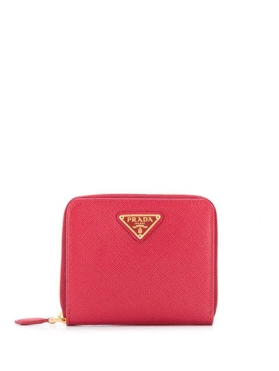 Prada Logo Plaque Zipped Wallet In Red