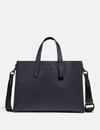 Coach Charlie Brief With Signature Canvas Blocking In Midnight Navy/charcoal/black Copper