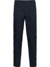 Prada Tapered Zipped Trousers In Blue