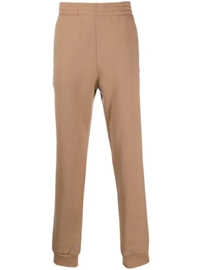 Msgm Logo Printed Track Trousers In Neutrals
