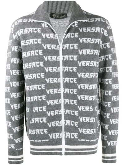 Versace Logo Intarsia Zipped Cardigan In Grigio Melange Bianco