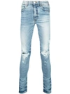 Amiri Distressed Skinny Jeans In Blue