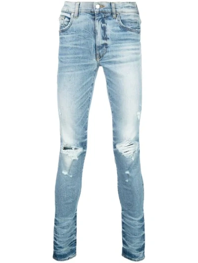 Amiri Distressed Skinny Jeans In Blue
