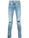 Amiri Distressed Skinny Jeans In Blue