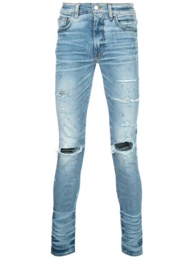 Amiri Distressed Skinny Jeans In Blue