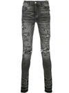 Amiri Distressed Skinny Jeans In Black