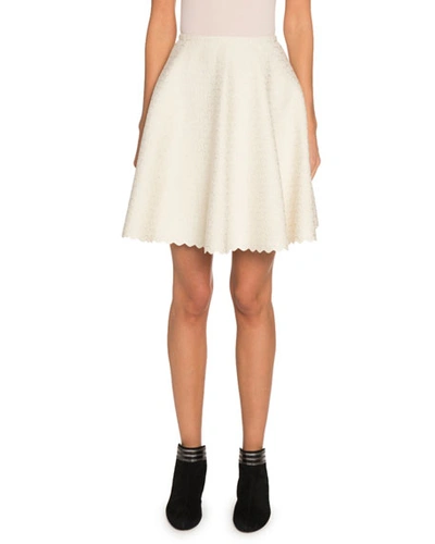 Alaïa Embossed Velvet Flare Mini Skirt In White