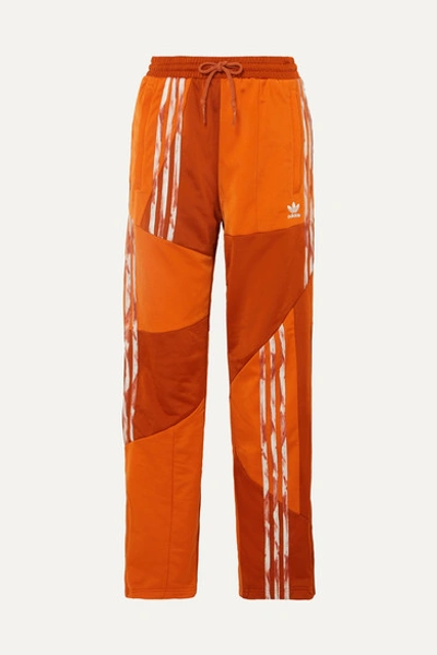 Adidas Originals + Daniëlle Cathari Striped Paneled Satin-jersey Track Pants In Orange