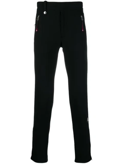 Alexander Mcqueen Logo Embroidered Track Trousers In Black