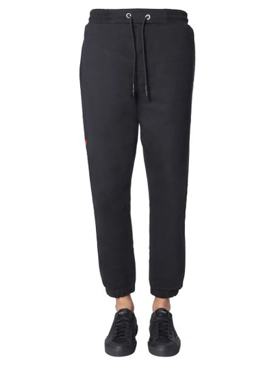 Mcq By Alexander Mcqueen Jogging Pants With Skull Patches In Black
