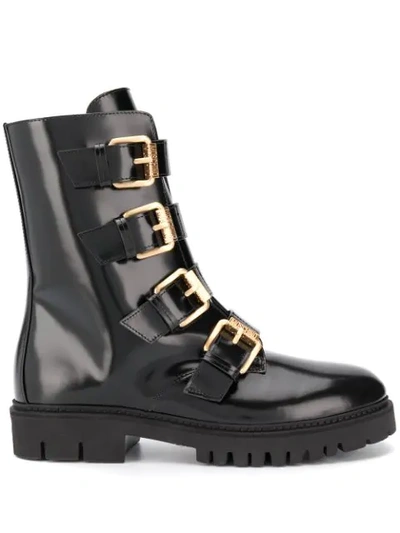 Moschino Buckled Ankle Boots In Black