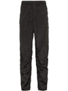 Stone Island Logo Patch Rip-stop Track Trousers In Black