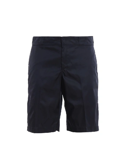 Prada Logo Detailed Nylon Gabardine Bermuda Pants In Dark Blue