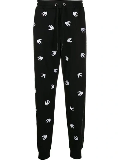 Mcq By Alexander Mcqueen All-over Swallow-print Joggers In Black
