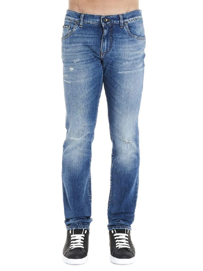 Dolce & Gabbana Logo Distressed Jeans In Blue
