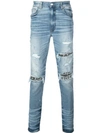 Amiri Music Note Patch Jeans In Medium Crafted Indigo