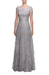 La Femme Sequin Floral Bateau-neck Cap-sleeve A-line Gown In Silver