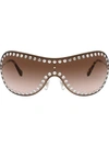 Miu Miu Enchant Sunglasses In Gold