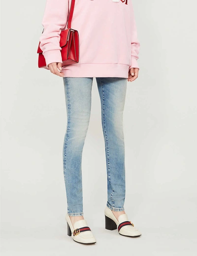 Gucci Patch-embroidered Skinny Mid-rise Jeans In Denim