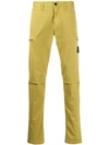 Stone Island Logo Patch Chinos In Yellow