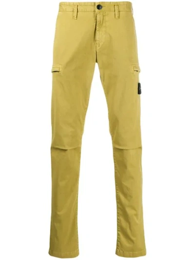 Stone Island Logo Patch Chinos In Yellow