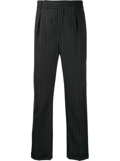Saint Laurent Striped Wool-herringbone Suit Trousers In Black