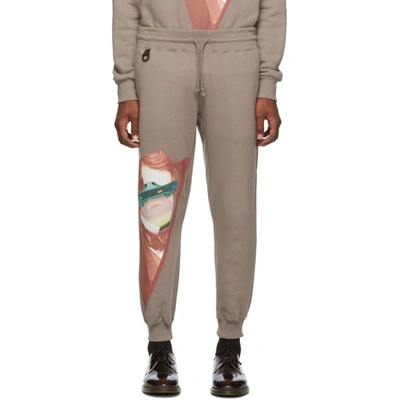 Undercover Printed Track Pants In Gray Beige