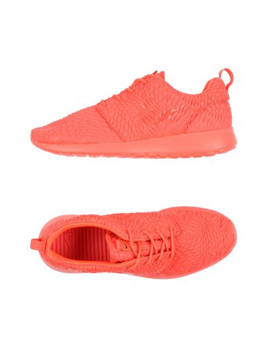 womens coral nike trainers