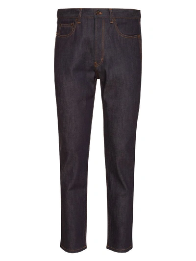 Saint Laurent Straight-cut Jeans With Cuffs In Indigo Raw Denim In Blu