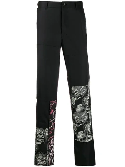 Comme Des Garçons Homme Deux Cartoon-panelled Trousers In Black