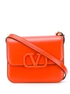 Valentino Garavani Logo Plaque Crossbody Bag In Lb8 Goldfish
