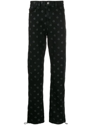 Geo Monogram Print Trousers In Black