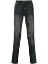 Amiri Studded Skinny-fit Jeans In Black